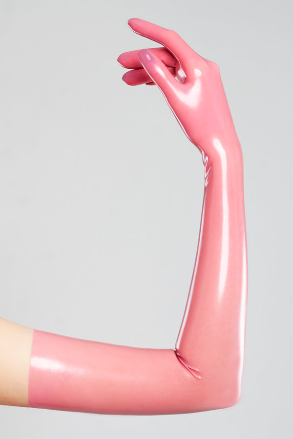 Long pink gloves made of moulded latex