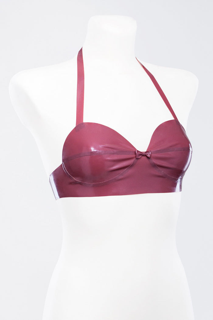 Latex bra decorated with small bow