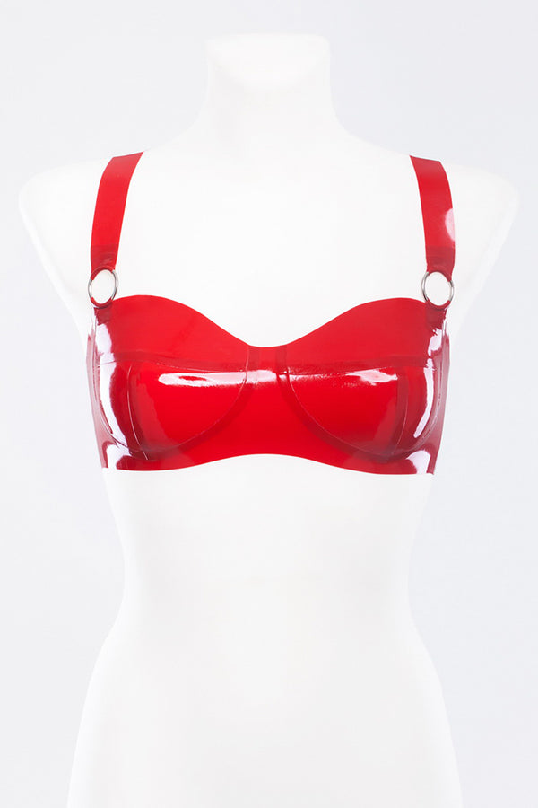 Latex bra decorated with metallic rings