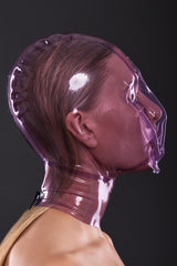 Latex ecstasy mask with a small hole for breath control