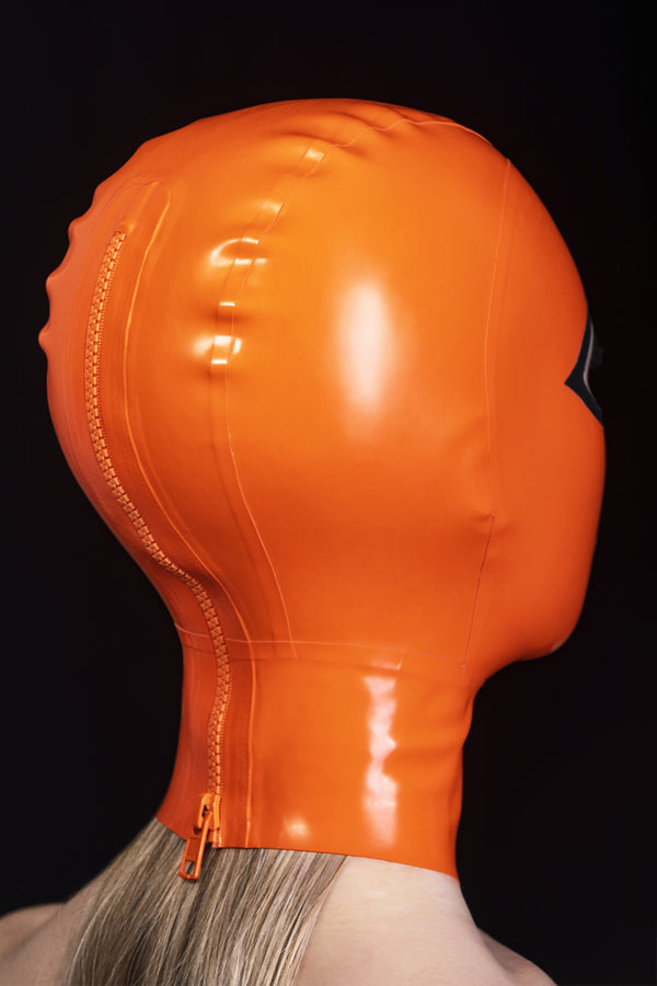 Latex mask with back zipper and contrasting eyes and mouth